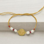 22kt Om Gold Rakhi